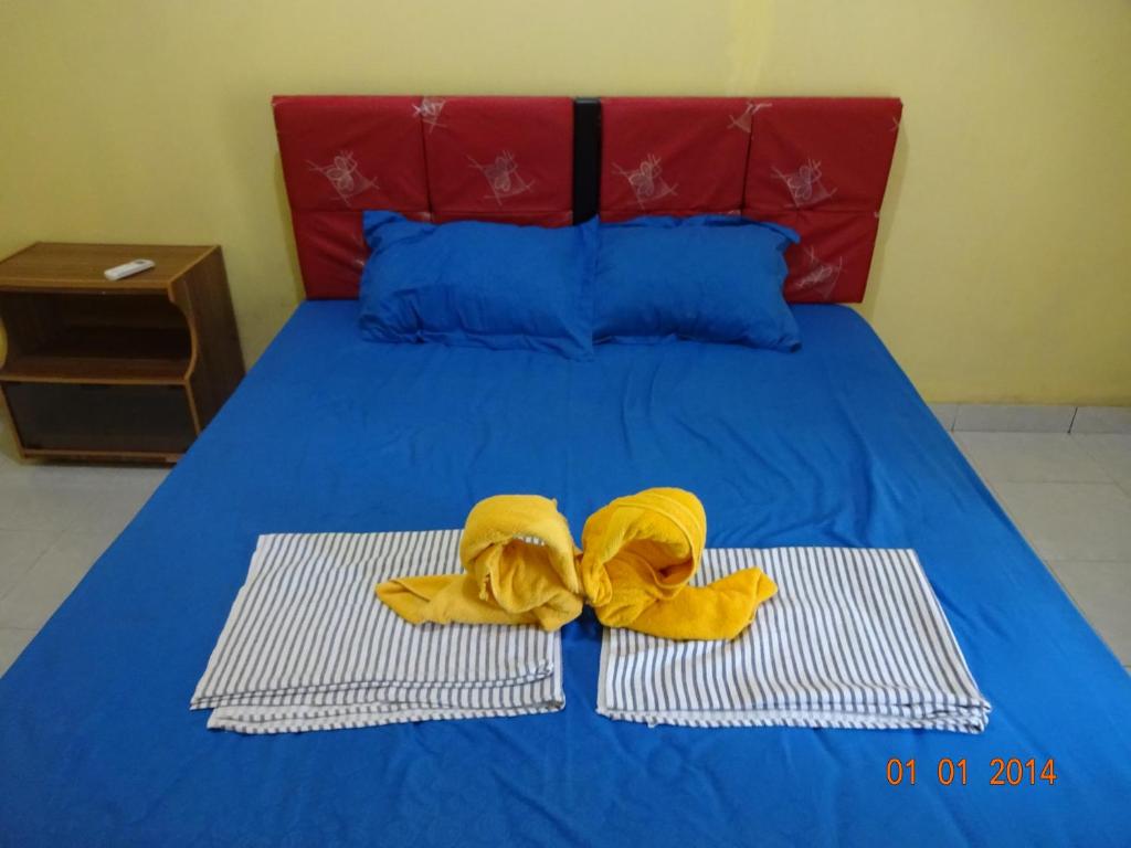 Postel nebo postele na pokoji v ubytování Honey Home