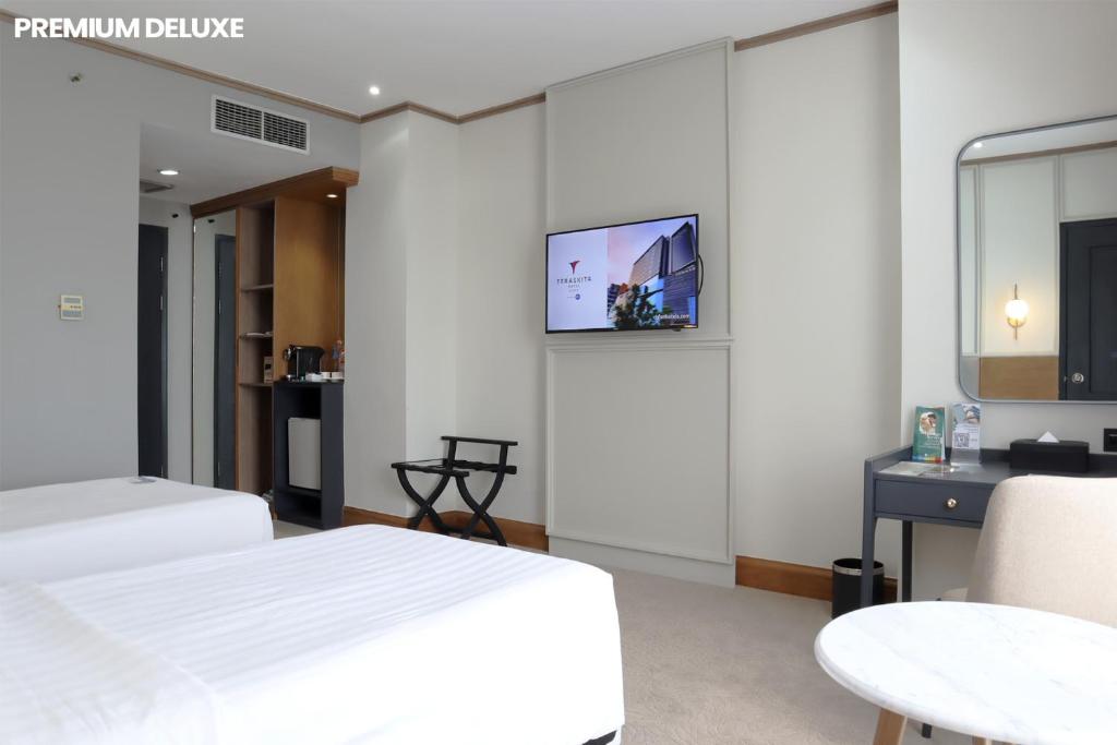 TV a/nebo společenská místnost v ubytování Hotel Dafam Semarang