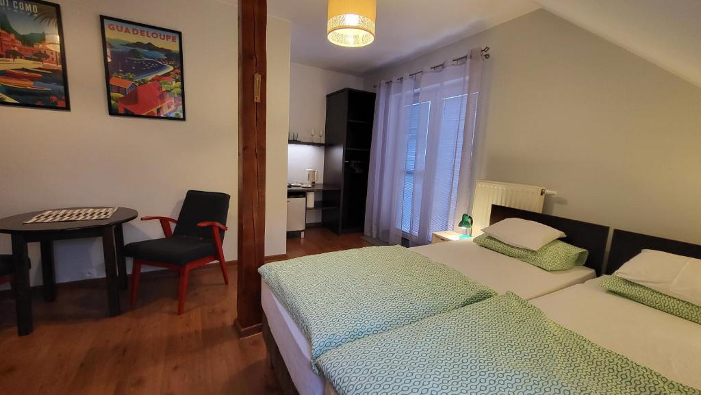 Postel nebo postele na pokoji v ubytování Pokoje Pod 22