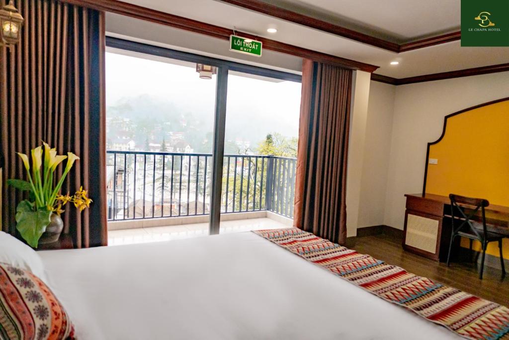 Postel nebo postele na pokoji v ubytování Le Chapa Hotel & Spa