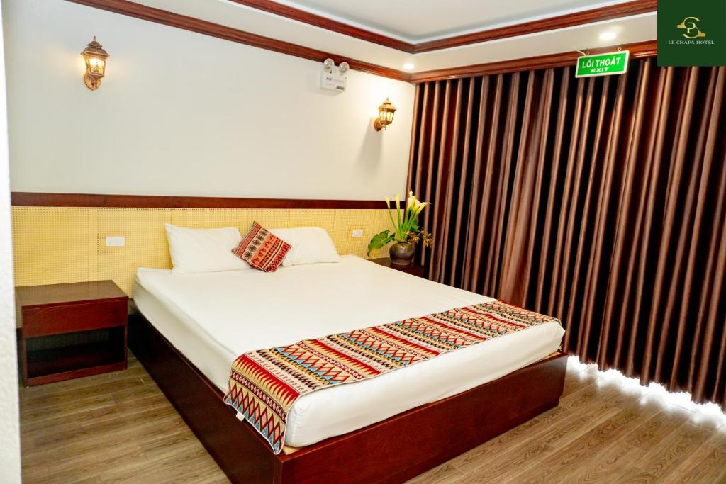 Postel nebo postele na pokoji v ubytování Le Chapa Hotel & Spa