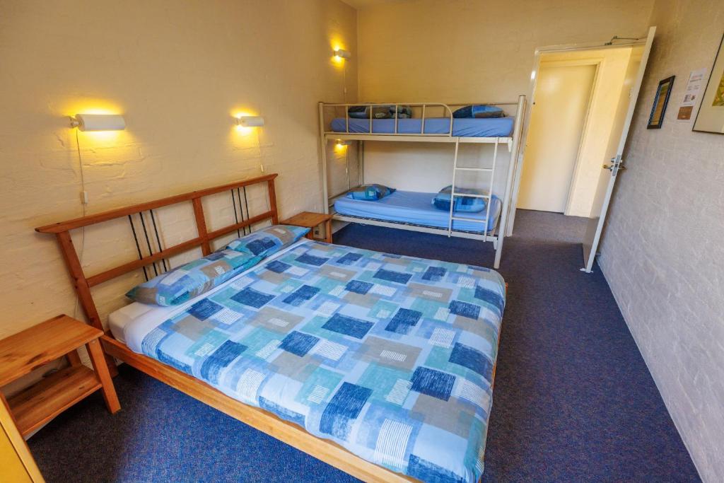 Postel nebo postele na pokoji v ubytování YHA Grampians Eco, Halls Gap