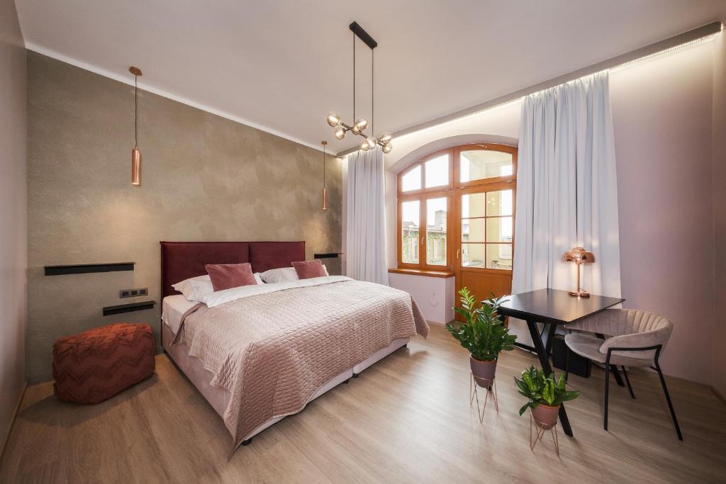 Säng eller sängar i ett rum på Penzion Martina****