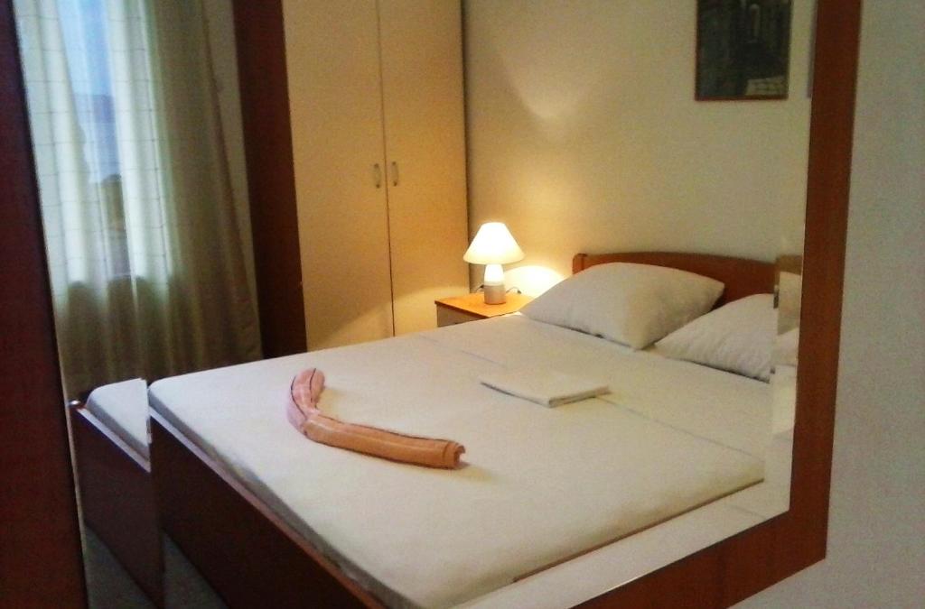 Postel nebo postele na pokoji v ubytování Apartments Roncevic #JOKO#