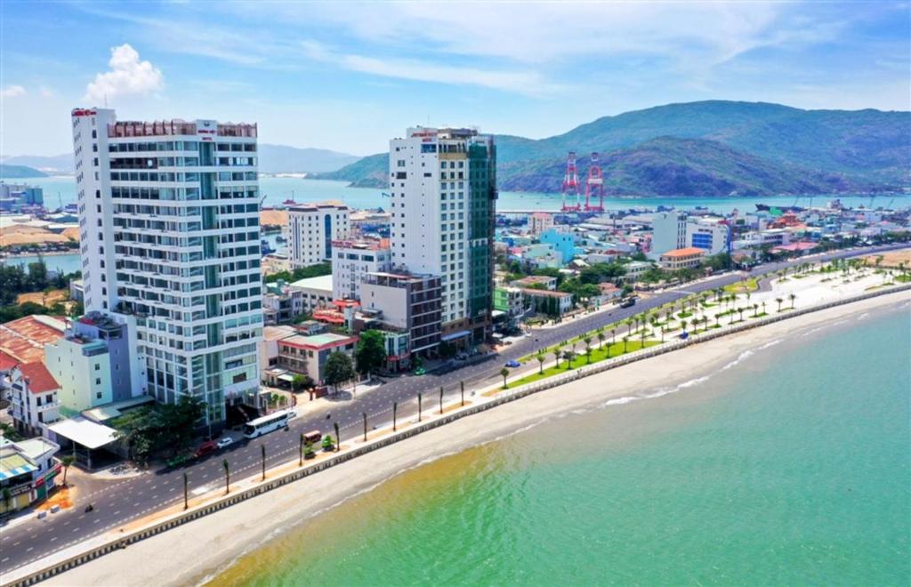 an aerial view of a beach and buildings at Huong Viet Hotel Quy Nhon - Beachfront in Quy Nhon