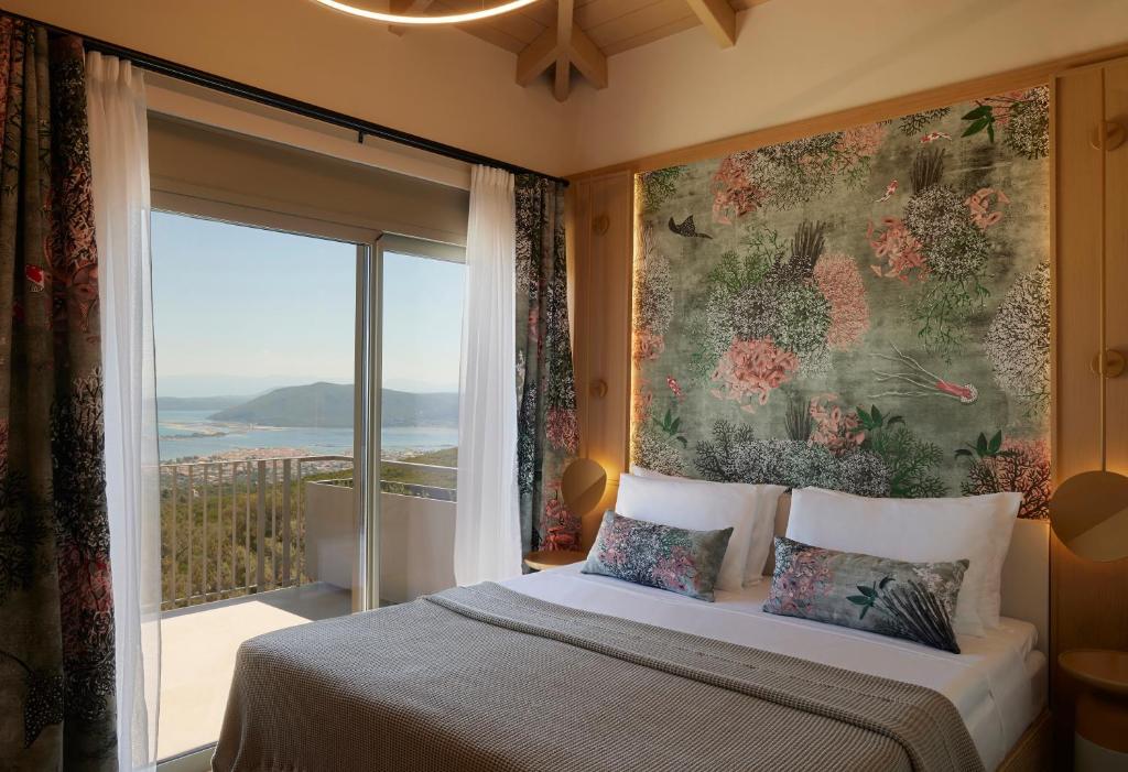 Postel nebo postele na pokoji v ubytování Epiphany Villas Lefkada