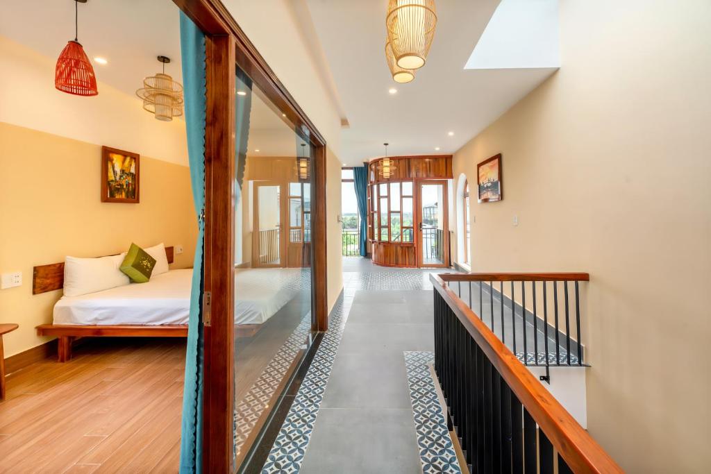 Postel nebo postele na pokoji v ubytování AN BANG CHIC VILLA