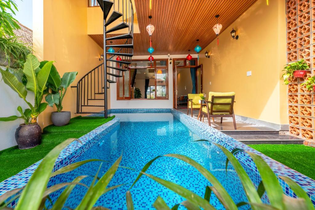 Πισίνα στο ή κοντά στο An Bang Chic Villa Nguyên Căn
