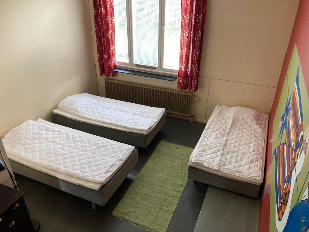 Postel nebo postele na pokoji v ubytování Kotapiha