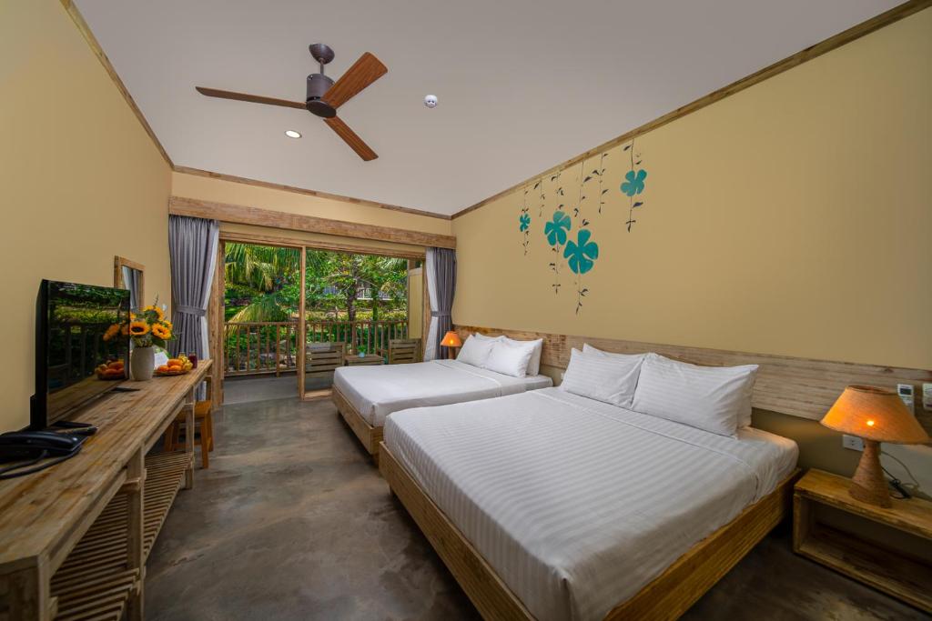 Postel nebo postele na pokoji v ubytování Lahana Resort Phu Quoc & Spa