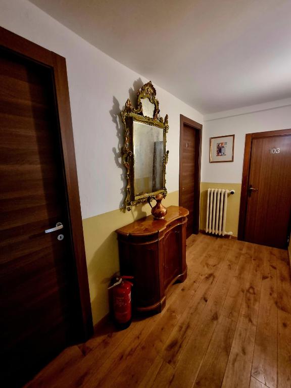 TV a/nebo společenská místnost v ubytování Albergo Casa Peron