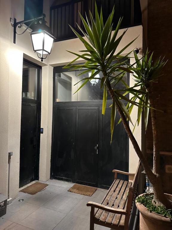 Patio lub wspólna przestrzeń na świeżym powietrzu w obiekcie GREEN&PURPLE STUDIO 24-24 Access