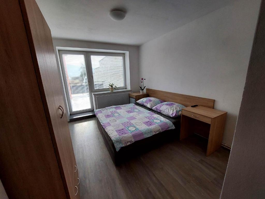 Postel nebo postele na pokoji v ubytování Penzion Strachotín