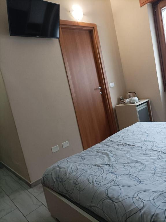 Postel nebo postele na pokoji v ubytování B&B Perbaccobar