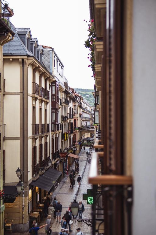 a view of a city street from a building at San Sebastián DOT Rooms in San Sebastián