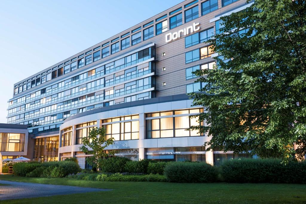 a large building with a lot of windows at Dorint Pallas Wiesbaden in Wiesbaden