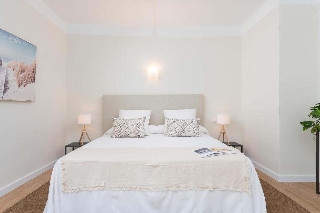 Cama ou camas em um quarto em Boutique Hotel Oriola