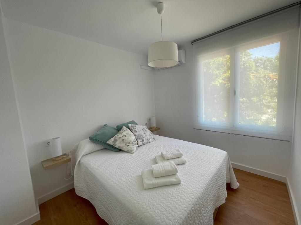 Postel nebo postele na pokoji v ubytování Apartamento Colina B 19.