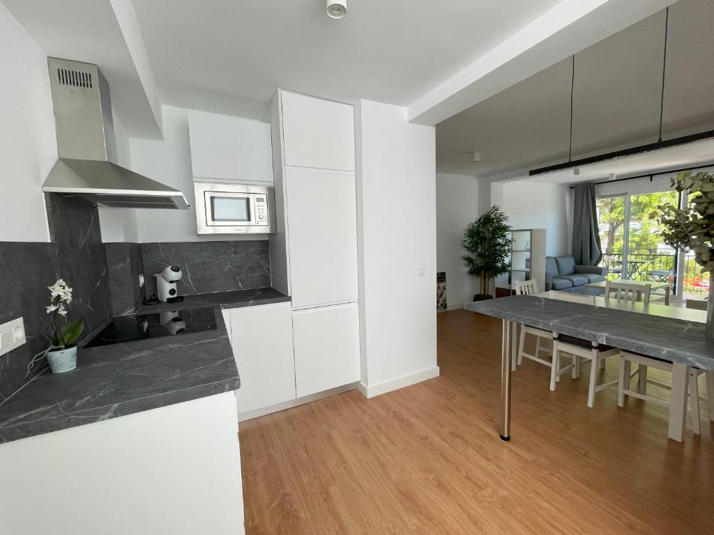 Kuchyň nebo kuchyňský kout v ubytování Apartamento Colina B 19.