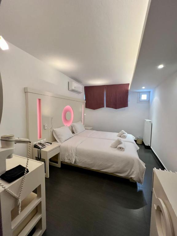 Postel nebo postele na pokoji v ubytování Matogianni Hotel