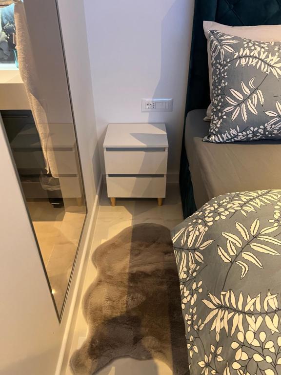 Postel nebo postele na pokoji v ubytování Madonna luxury rooms