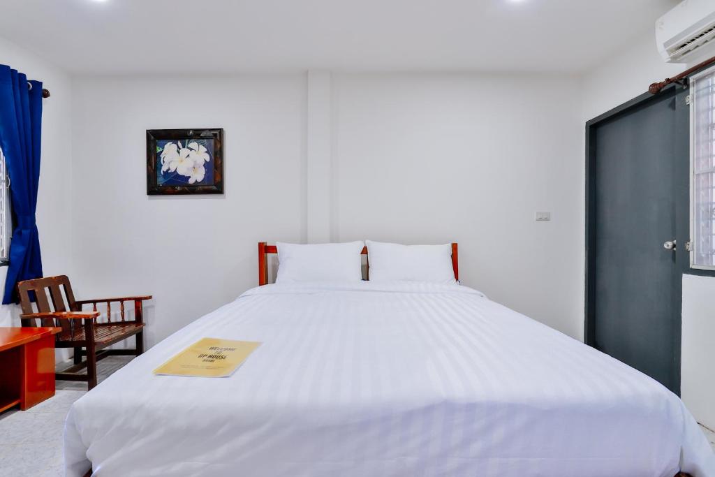 Postel nebo postele na pokoji v ubytování GP House Krabi Aonang Beach