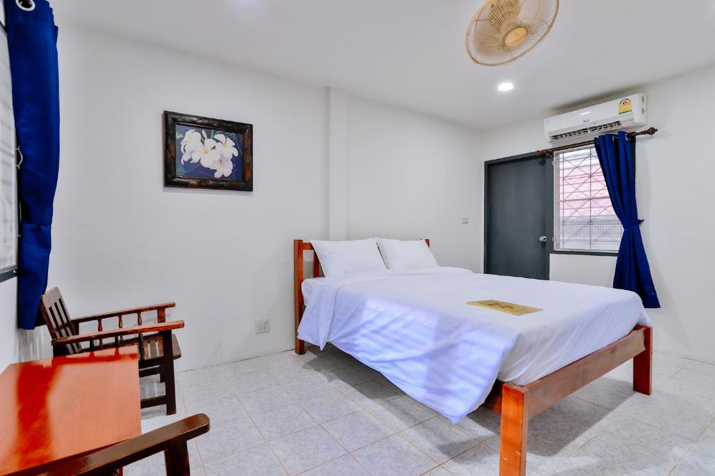 Postel nebo postele na pokoji v ubytování GP House Krabi Aonang Beach