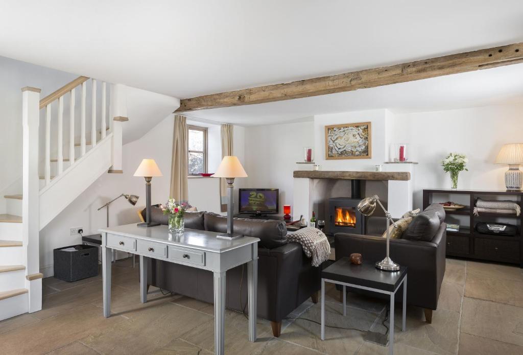 Ruang duduk di Hampton Wafre Cottage