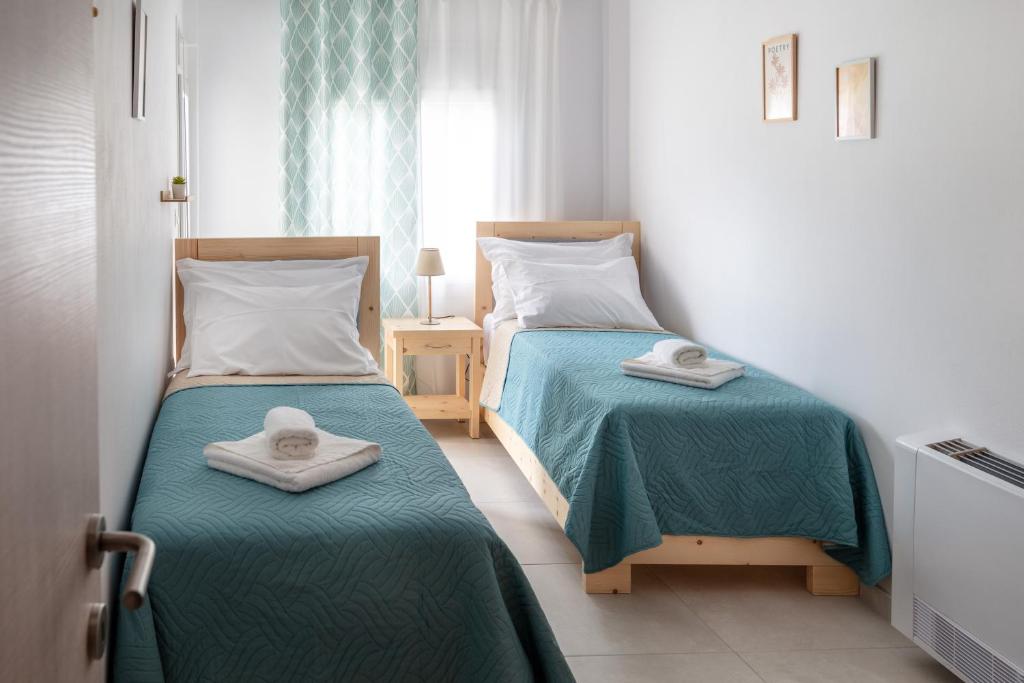 Postel nebo postele na pokoji v ubytování Serenity apartment Mochlos