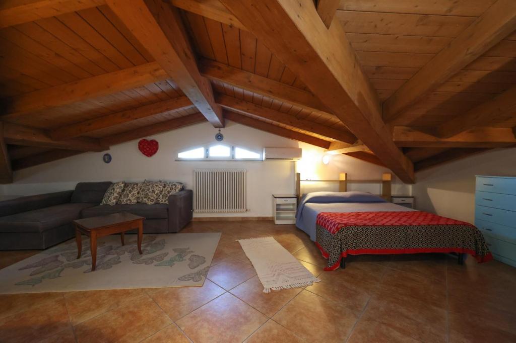 Postel nebo postele na pokoji v ubytování Villa Circuito Simoncelli