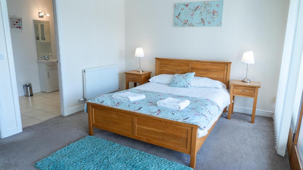 Ein Bett oder Betten in einem Zimmer der Unterkunft Tewitfield Marina