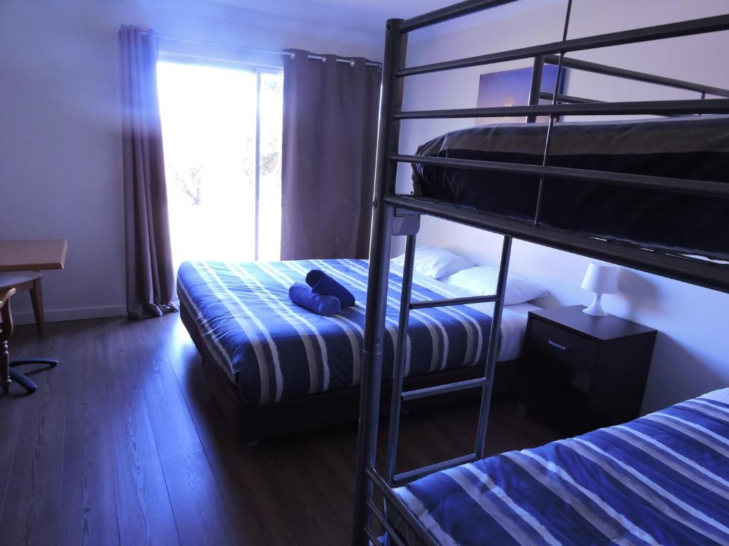 Postel nebo postele na pokoji v ubytování Siesta Villa
