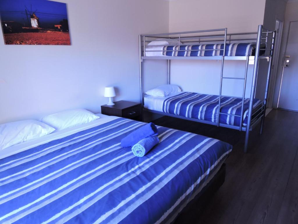 Postel nebo postele na pokoji v ubytování Siesta Villa