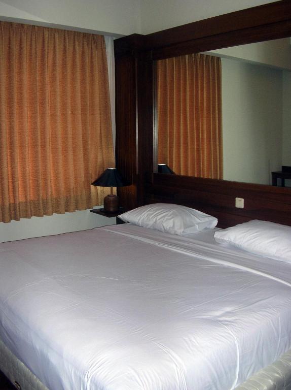 Katil atau katil-katil dalam bilik di Wirton Hotel