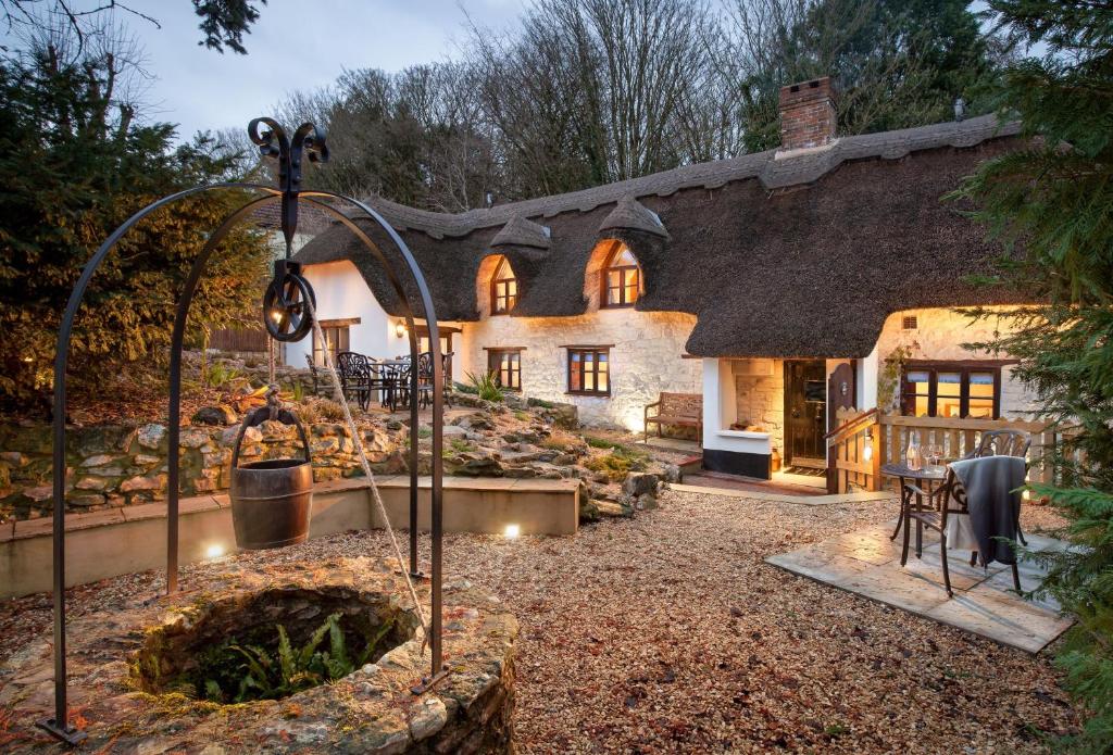 a house with a garden in front of it at Smithycroft in Combe Saint Nicholas