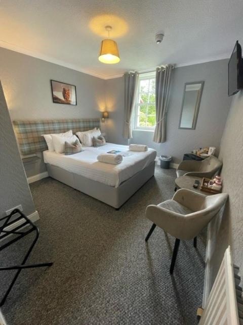Postel nebo postele na pokoji v ubytování Isle of Skye Guest House