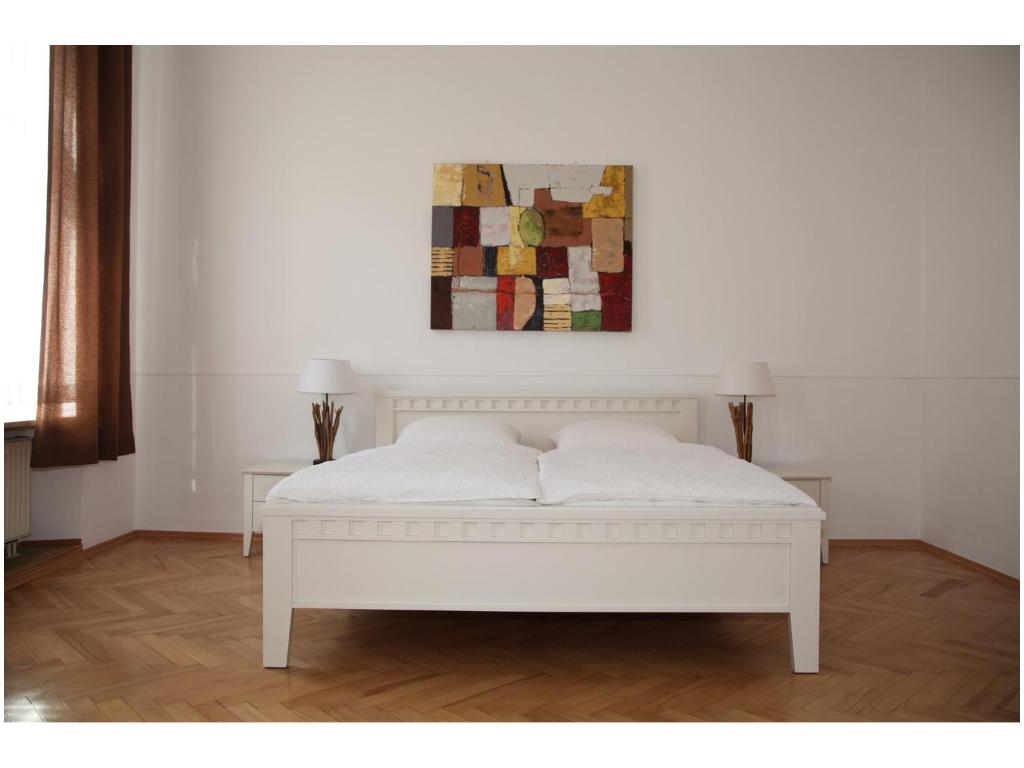 Postel nebo postele na pokoji v ubytování Monello Apartments - Charmanter Altbau