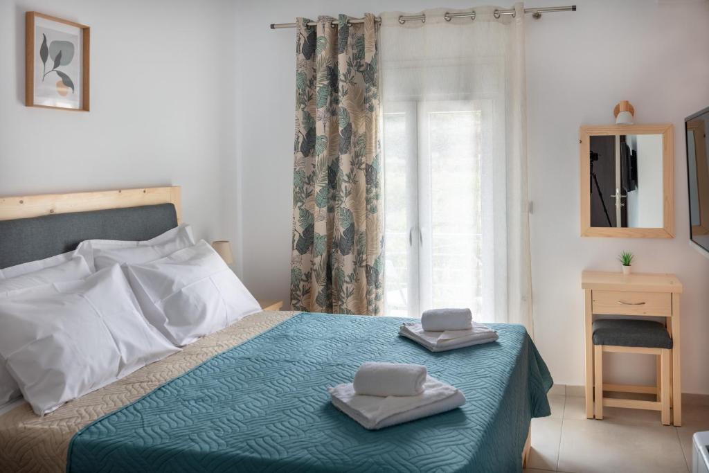 Postel nebo postele na pokoji v ubytování Serenity apartment Mochlos