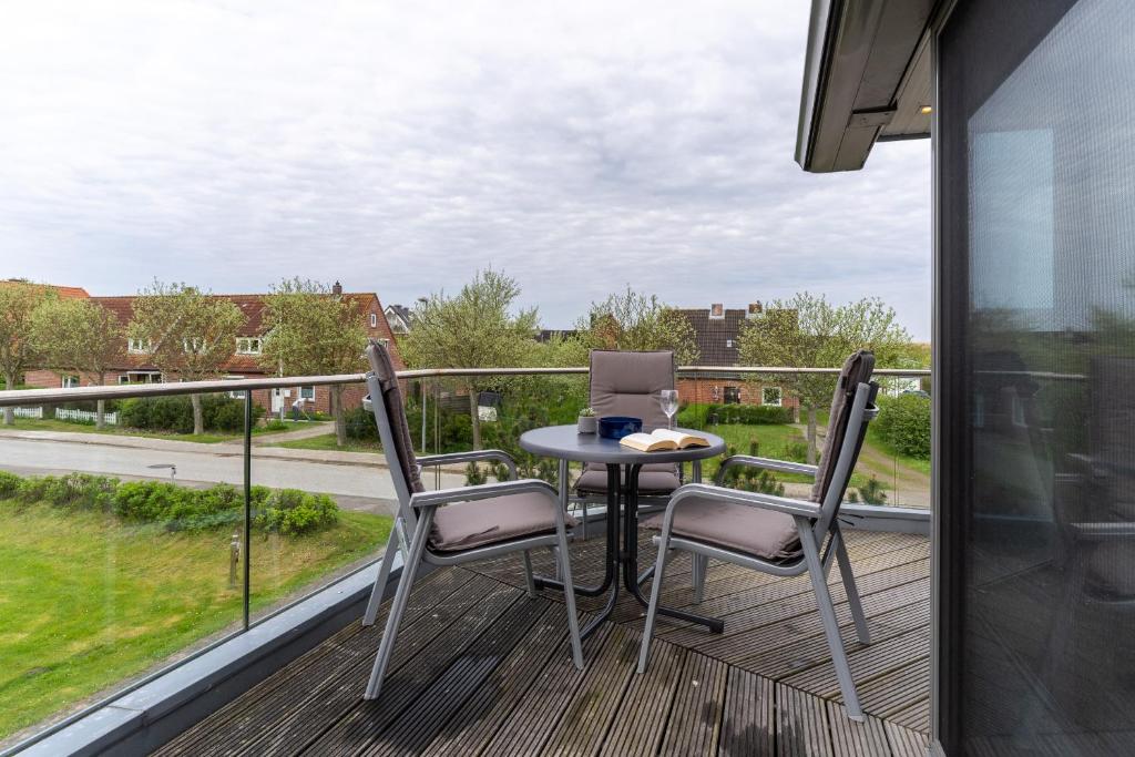 Balkón nebo terasa v ubytování Ferienhaus Kirchenstraße Appartement Achtern Diek OG