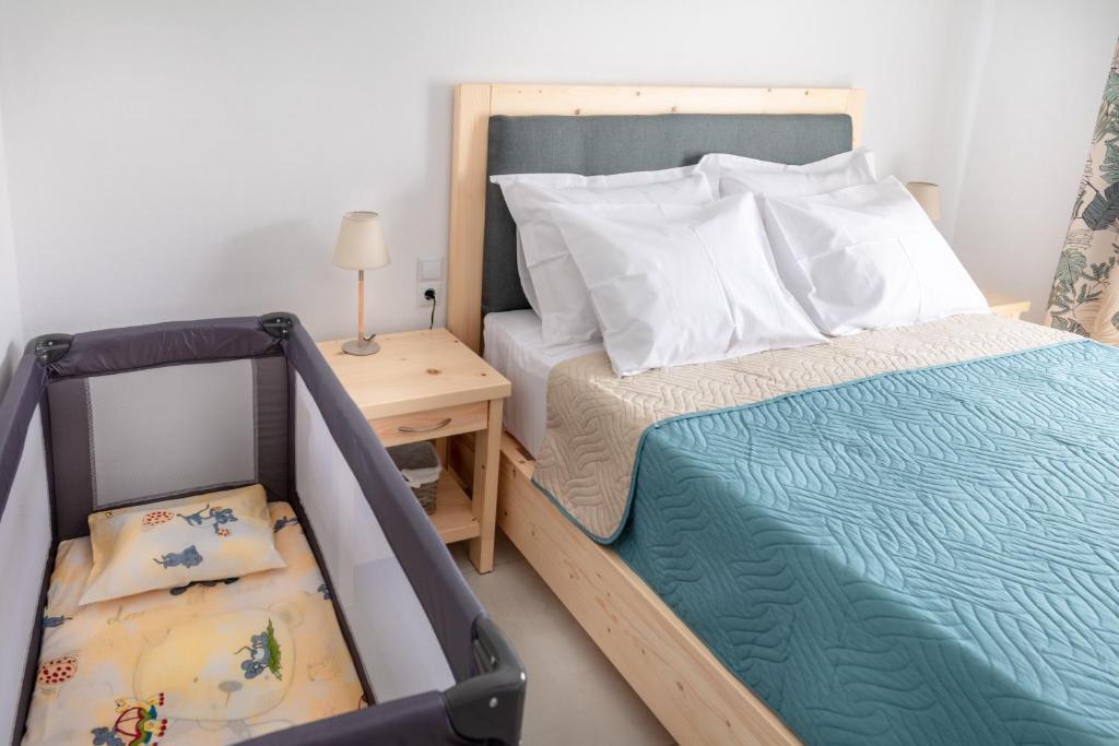 Postel nebo postele na pokoji v ubytování Serenity apartment Mochlos