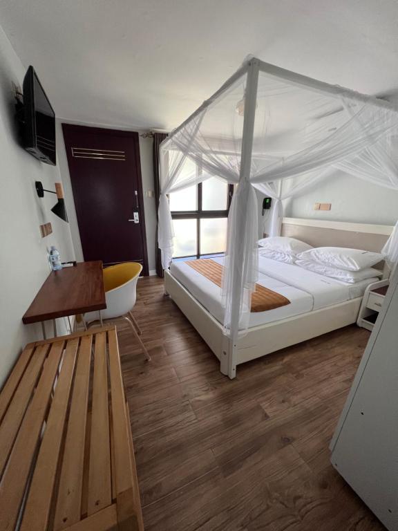 Postel nebo postele na pokoji v ubytování Zebi Ecolodge