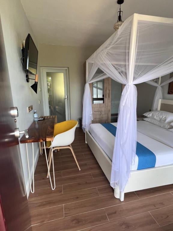 Postel nebo postele na pokoji v ubytování Zebi Ecolodge