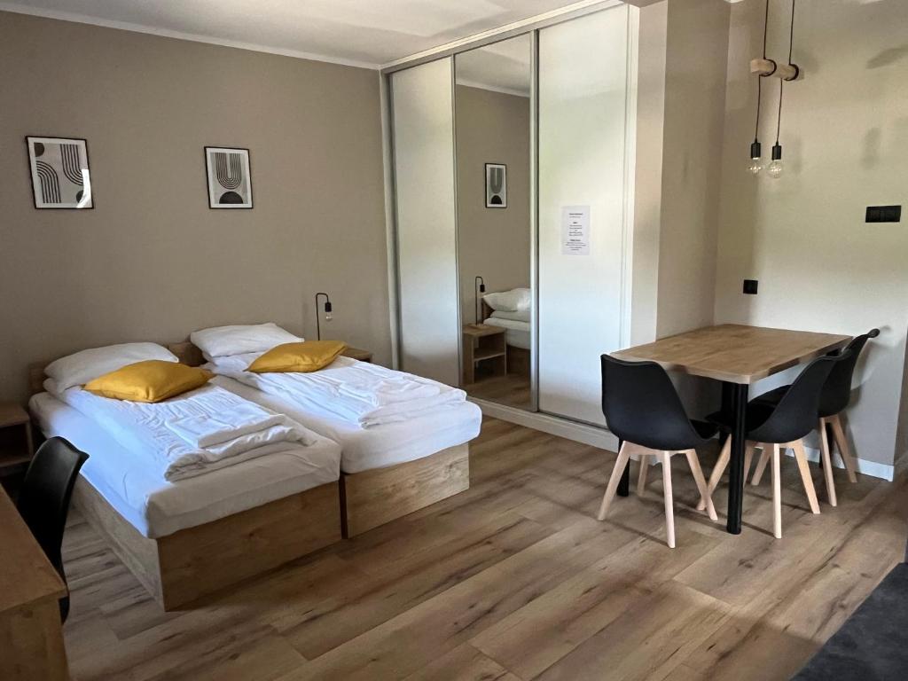 Posteľ alebo postele v izbe v ubytovaní Krollhouse Pokoje gościnne
