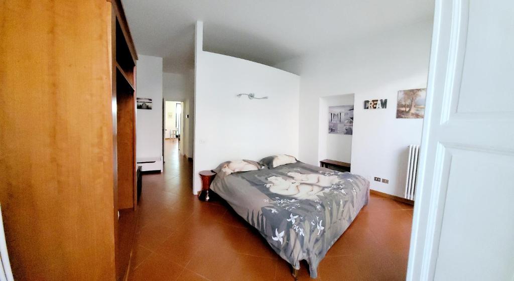 Posteľ alebo postele v izbe v ubytovaní Le 5 vie, lago Maggiore