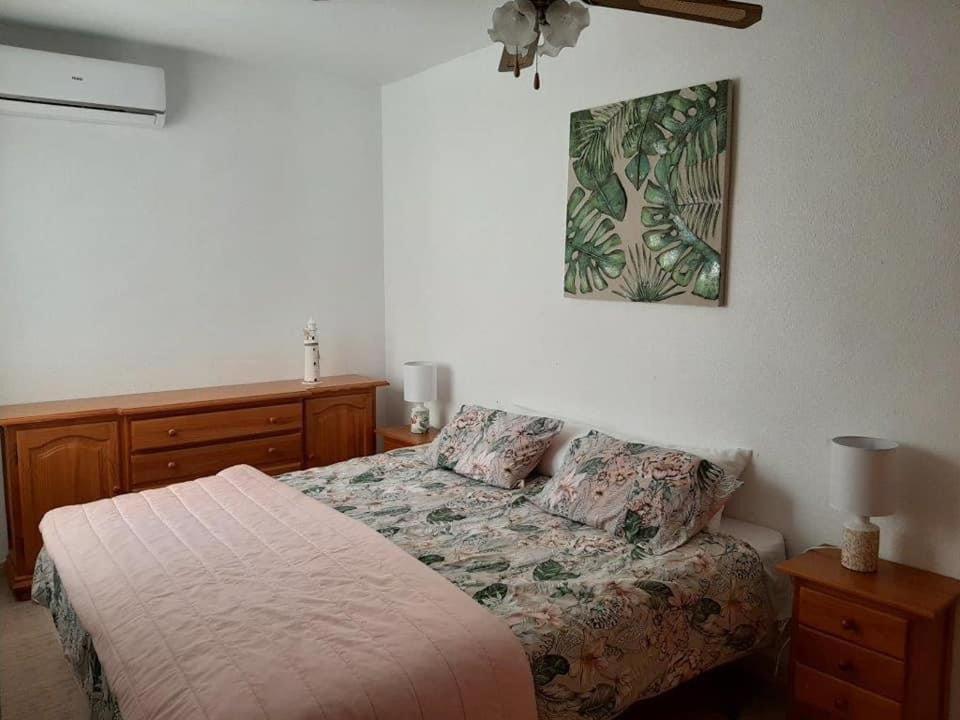 Postel nebo postele na pokoji v ubytování Vistamar II