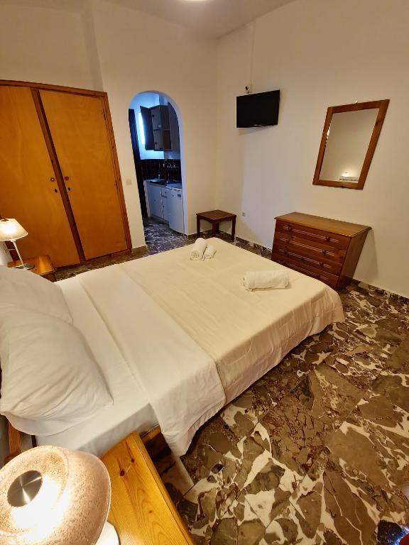 Postel nebo postele na pokoji v ubytování Alexandra Studio 6