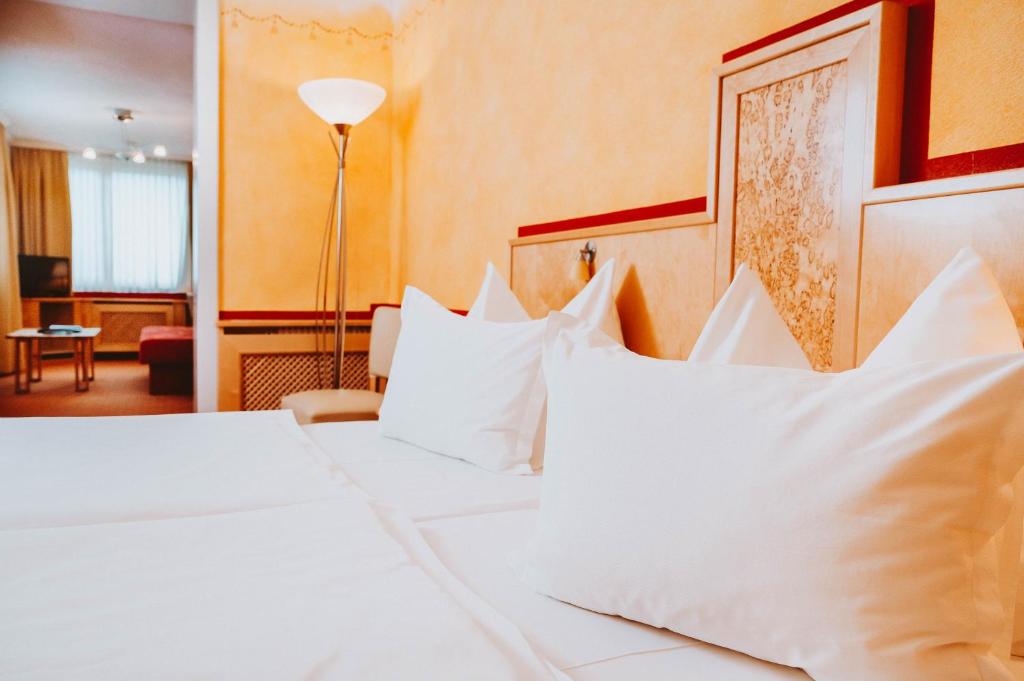 Postel nebo postele na pokoji v ubytování Hotel Brücklwirt