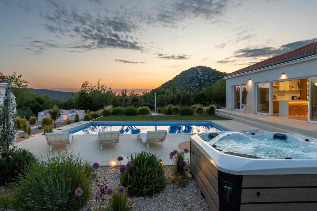 The swimming pool at or close to Villa Nebesi with pool and jacuzzi
