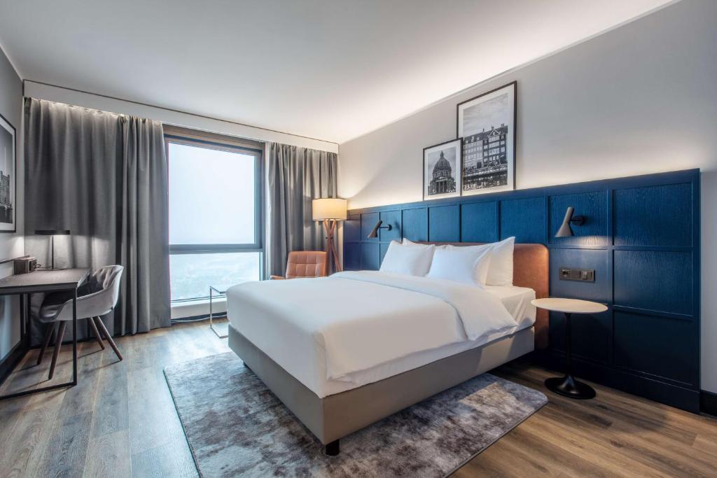 Postel nebo postele na pokoji v ubytování Radisson Blu Scandinavia Hotel, Copenhagen