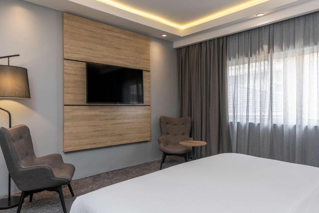 TV a/nebo společenská místnost v ubytování Park Inn by Radisson, Lagos Victoria Island